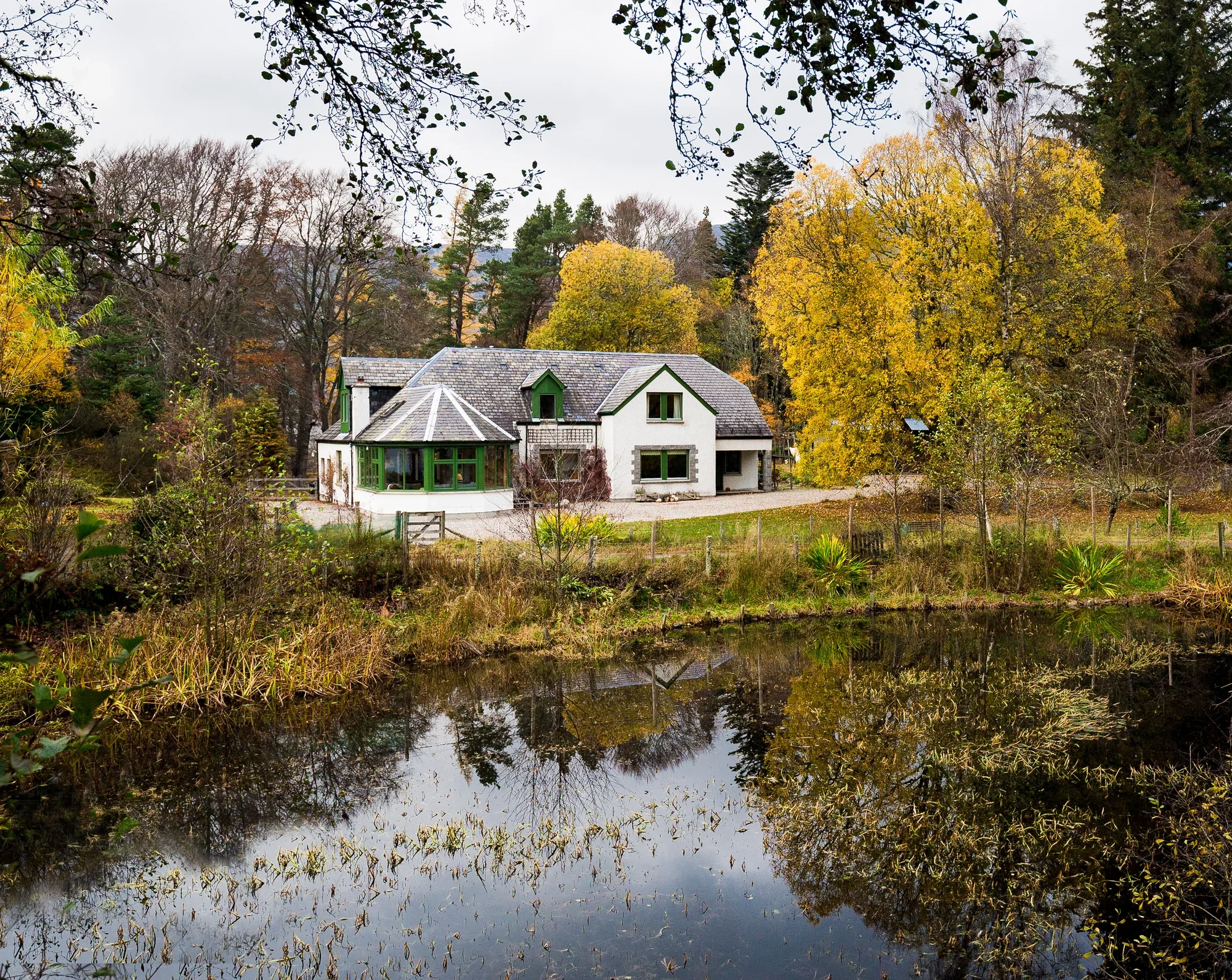 Glentruim Lodge exterior by day — the front of the house with the garden in view